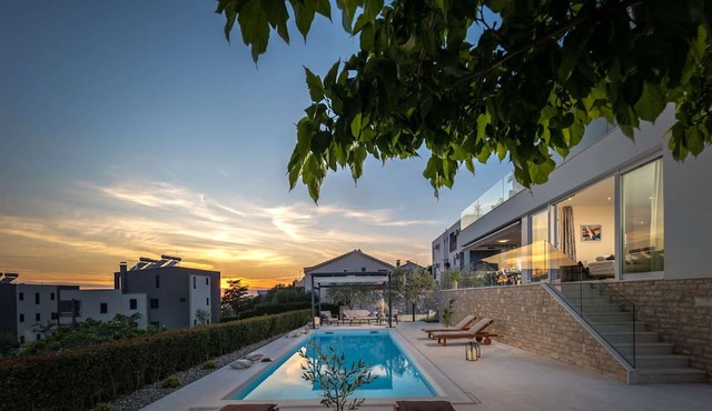 Beautiful and modern villa with heated pool and sea view in Kožino