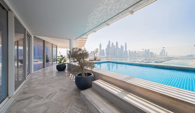 Jaw-dropping 3BR Apt W/Seaview & Private Pool in Dubai