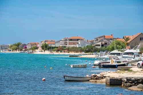 Beachfront Villa Marivi with Pool, Jacuzzi and Game Room