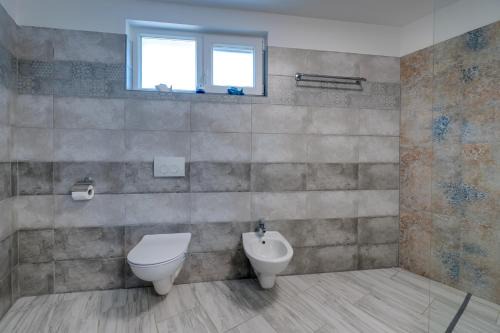 Modern villa with heated pool, whirpool in quiet area - by Traveler tourist agency Krk ID 2180 in Gostinjac