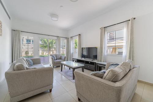Specious 2BR VILLA WITH MAIDROOM AND HUGE GARDEN IN JVT DUBAI in Dubai